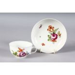 A VIENNA CUP AND SAUCER painted with roses. Vienna beehive mark.
