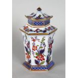 A 19TH CENTURY JAPAN PATTERN HEXAGONAL TEA CADDY AND COVER. 6.5ins high.