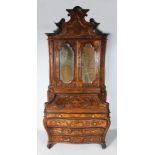 A SUPERB 18TH CENTURY ITALIAN FIGURED WALNUT BUREAU BOOKCASE, with shaped top, a pair of mirrored