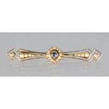 A 14CT GOLD AND SEED PEARL BAR BROOCH.