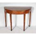 A GEORGE III FIGURED MAHOGANY HALF MOON CARD TABLE, with fold-over top, green baize interior,