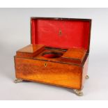 A GEORGE III SATINWOOD TWO-DIVISION TEA CADDY, with two lidded tea boxes, rising lid and supported