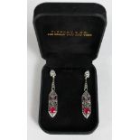 A PAIR OF SILVER ART DECO STYLE RUBY SET DROP EARRINGS.