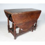 AN 18TH CENTURY OAK OVAL DROP FLAP GATE-LEG DINING TABLE. 4ft 10ins wide x 3ft 9ins deep.