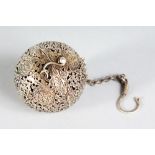AN ISLAMIC ENGRAVED AND PIERCED BALL TRAVELLING CENSER.