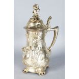 A LARGE PLATED CLASSICAL TANKARD with cupids in relief. 16ins high.