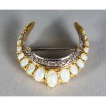 AN 18CT GOLD, DIAMOND AND OPAL CRESCENT BROOCH.