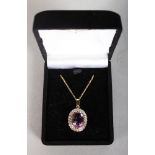 A 9CT GOLD, DIAMOND AND AMETHYST PENDANT AND CHAIN.
