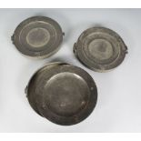 À PAIR OF 18TH CENTURY PEWTER WARMING PLATES, touch mark for JOHN CARPENTER, LONDON; and a similar