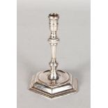 A GEORGE I TAPER STICK, with a hexagonal shape base. Maker: Joseph Bird. London 1721. 4.5ins high.