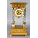 A SUPERB EMPIRE ORMOLU AND CUT CRYSTAL PORTICO CLOCK, with eight-day drum movement striking on a