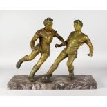 A LARGE ART DECO GILT METAL GROUP OF TWO FOOTBALLERS on a marble base. 24ins long x 20ins high.