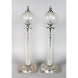 A PAIR OF ENGRAVED LAMP BASES. 20ins.