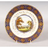 A GOOD DERBY PLATE, painted with a "View of Ripon in Yorkshire", Puce Mark No. 262, with a rich blue