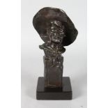 AFTER FREDERIC REMMINGTON THE "SERGEANT". A BRONZE BUST HEAD OF A MAN. Signed. 10ins high, on a