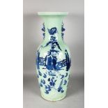 A LARGE CHINESE BLUE AND WHITE CELADON VASE. 24ins high.
