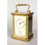 A 19TH CENTURY FRENCH BRASS ALARM CARRIAGE CLOCK. 4ins high.