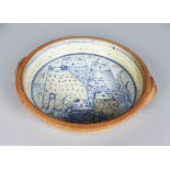 A LARGE STUDIO ALLER POTTERY CAT DISH by BRYAN & JULIE NEWMAN, stamped on the base. 1ft 3ins