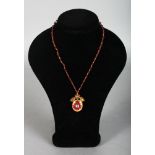 A SUPERB VICTORIAN GOLD, RUBY AND DIAMOND PENDANT AND CHAIN.