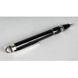 A MONT BLANC ROLLER BALL PEN.