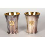 A PAIR OF PRESENTATION BEAKERS. Maker: C. J. Vander. London 1965. 3.75ins high.