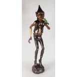 A GOOD TWO-COLOUR BRONZE STANDING PIXIE holding a frog. 38ins high.