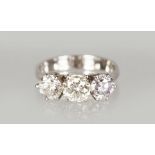 AN 18CT WHITE GOLD THREE STONE DIAMOND RING of 2.3CTS approx.