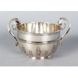 A VICTORIAN TWO-HANDLED CIRCULAR CHALLENGE CUP. 4.5ins diameter. London 1894. Weight 10ozs.