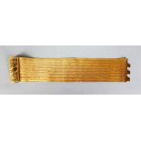 A GOOD TURKISH GOLD WIDE BRACELET. 78gms.