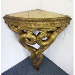 A VERY GOOD PAIR OF 18TH CENTURY CARVED AND GILDED CONSOLE TABLES, with one marble top, the frames