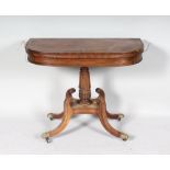 A REGENCY MAHOGANY TEA TABLE with brass inlay, centre column ending in quadruple curving legs and