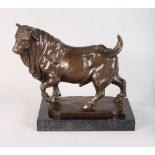 GIAMBOLOGNA A BRONZE BULL. Signed. 9ins high, on a black marble base.