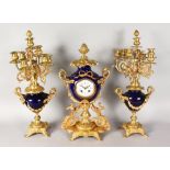 A GOOD LOUIS XVI BLUE PORCELAIN AND ORMOLU CLOCK GARNITURE, the clock with eight-day movement,