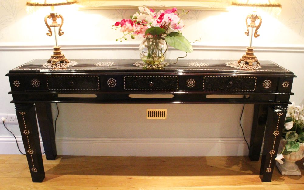 AN EASTERN LACQUER CONSOLE TABLE, with three frieze drawers, and all-over mother-of-pearl inlaid