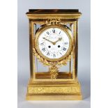 A SUPERB LOUIS XVI GILT ORMOLU FOUR GLASS CLOCK, the movement by GILLES LAINE, PARIS, with eight-day