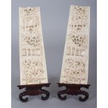 A PAIR OF GOOD QUALITY EARLY 20TH CENTURY CHINESE IVORY WRIST RESTS, together with fitted wood