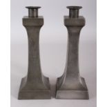 A PAIR OF EARLY 20TH CENTURY CHINESE ART DECO STYLE PEWTER CANDLESTICKS, each with detachable sconce