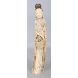 AN EARLY 20TH CENTURY CHINESE IVORY FIGURE OF LAN TS’AI HO, weighing approx. 750gm, the female