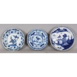 A GROUP OF THREE 18TH CENTURY CHINESE BLUE & WHITE PORCELAIN SAUCERS, the largest 4.7in diameter. (