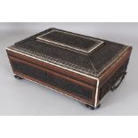 A 19TH CENTURY INDIAN CARVED SANDALWOOD JEWELLERY BOX, with ivory and ebony mosaic borders, the