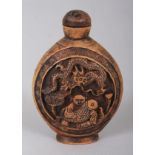 A CHINESE WOOD SNUFF BOTTLE & STOPPER, 2.75in high.