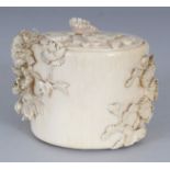 A JAPANESE MEIJI PERIOD IVORY BOX & COVER, the sides and cover carved in high relief with peony