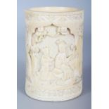 A FINE QUALITY 19TH CENTURY CHINESE IVORY BRUSHPOT, the sides carved in deep relief with barbed