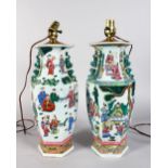 A PAIR OF CHINESE LAMPS, painted with figures. 17ins high (converted to lamps).