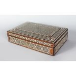 AN ISLAMIC MOSIAC BOX, 11.5ins x 7.5ins.