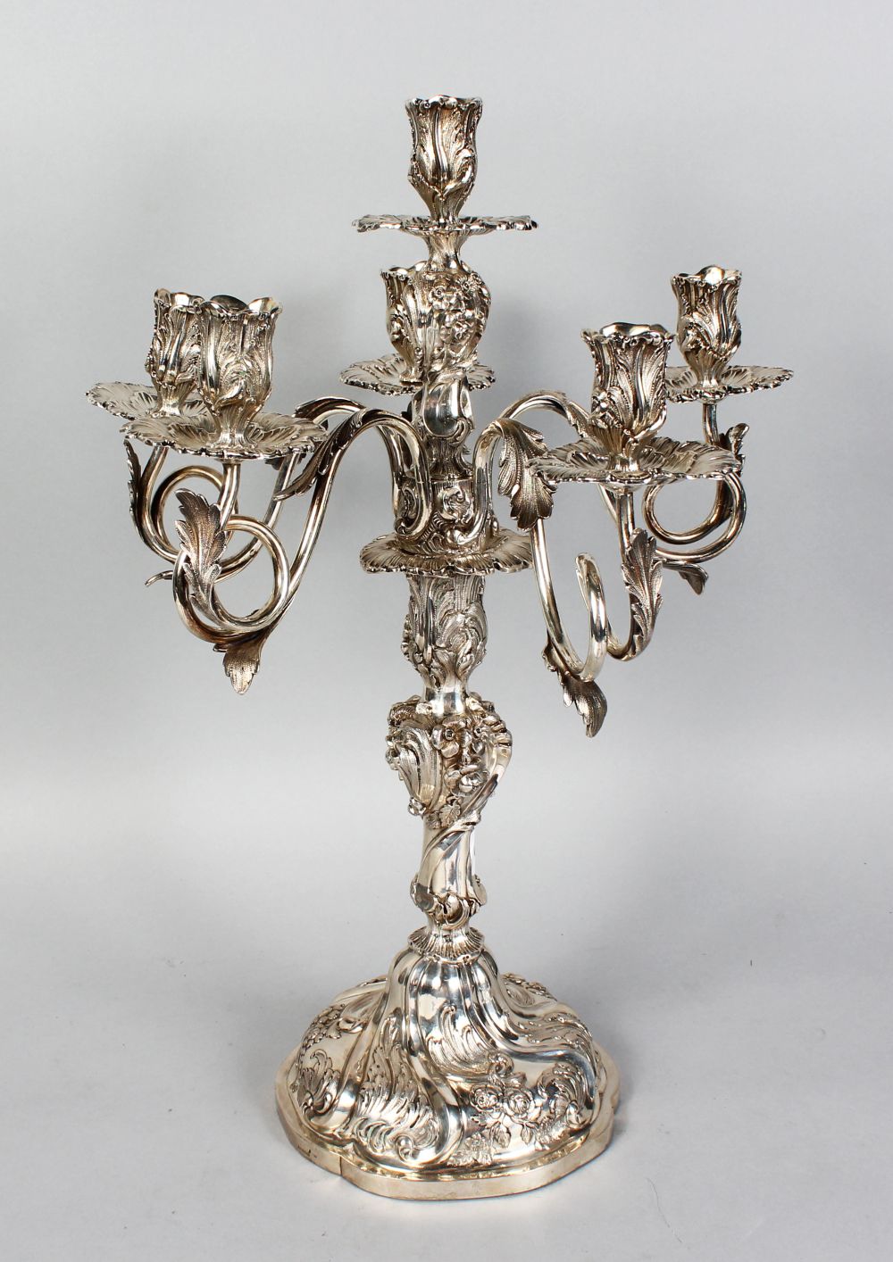 A GERMAN SILVER SIX LIGHT CANDELABRA by HALLER & RATHENAU, stamped .750, with five scrolling