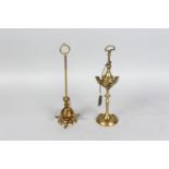 TWO BRASS OIL LAMPS. 10ins high.