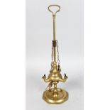 A BRASS OIL LAMP. 17ins high.