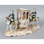 A SAMSON OF PARIS GROUP OF TWO MEN ON HORSES CARRYING A SEDAN CHAIR. 11ins long.