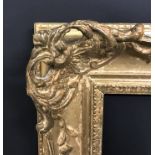 20th Century English School. A Gilt Swept and Pierced Centres and Corners Composition Frame, 24.5" x